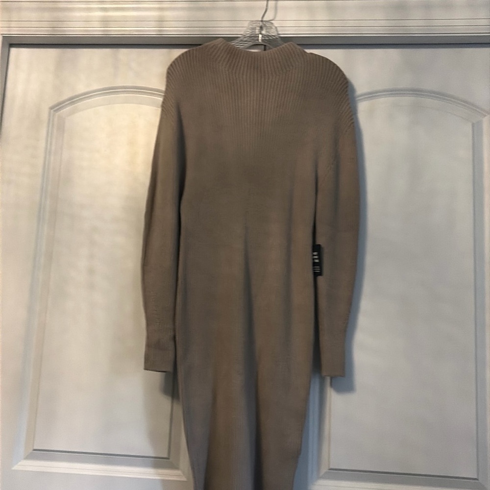 Brand new with tags! Thick soft Express Sweater dress to knee! Size small!